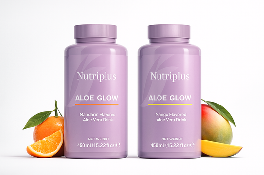 Two bottles of Nutriplus Aloe Glow with fruits on a white background